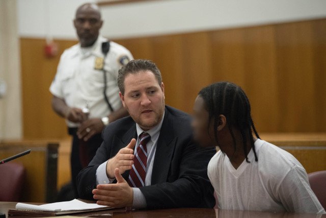 Jonathan Rosenberg in courtroom with client